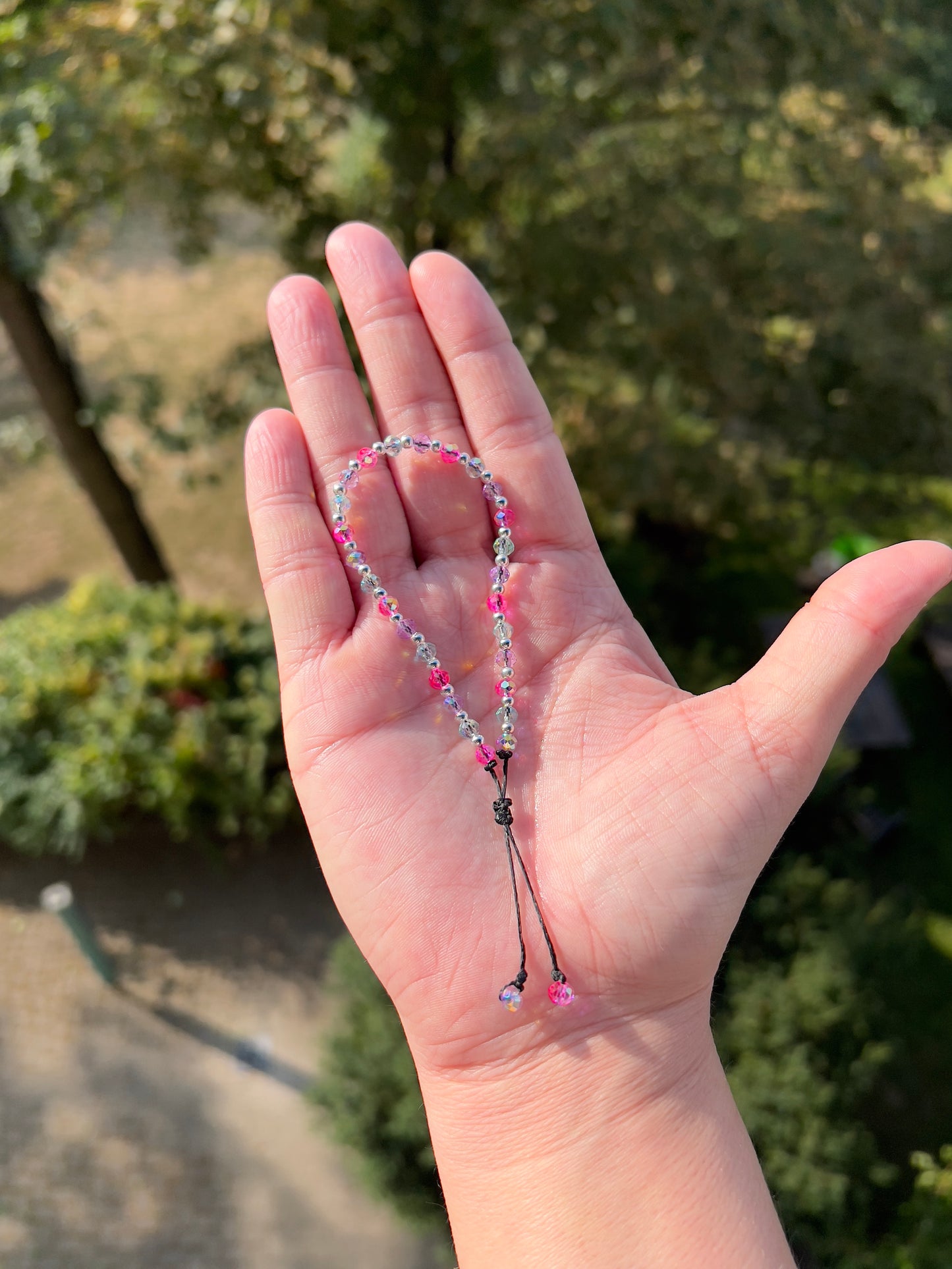 Armband Kristallzauber – Facettierte österreichische Kristallperlen in Pink, Mint & Lavendel mit 925er Silber, Makramé