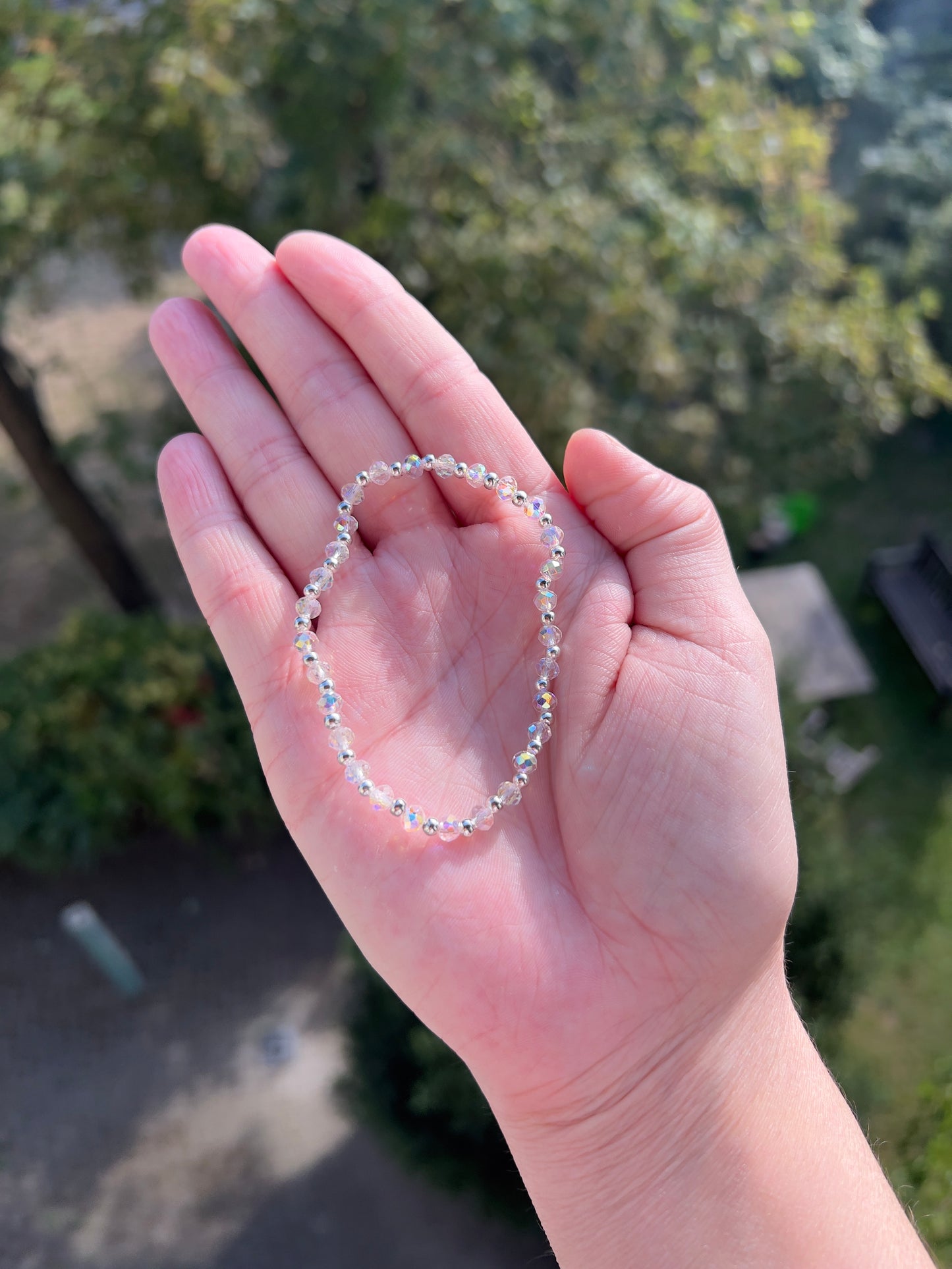 Armband aus facettiertem österreichischem Kristall in Weiß-Opal-Schimmer – 4 mm, wahlweise pur, mit 925er Silber oder vergoldetem Edelstahl