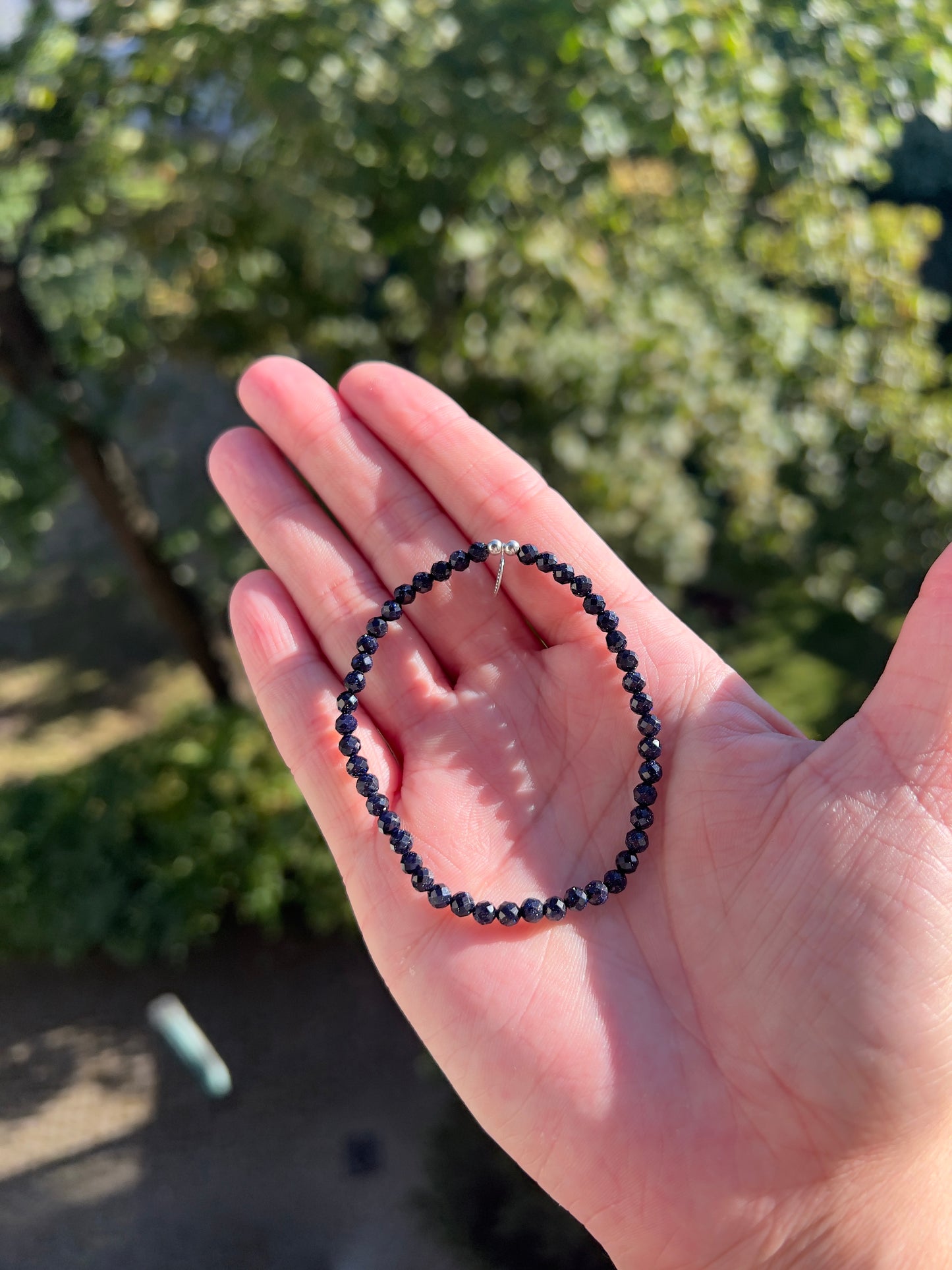 Armband Gold-Blau (synthetisch) mit 925er Silber-Feder – Inspiration, Leichtigkeit & positive Energie