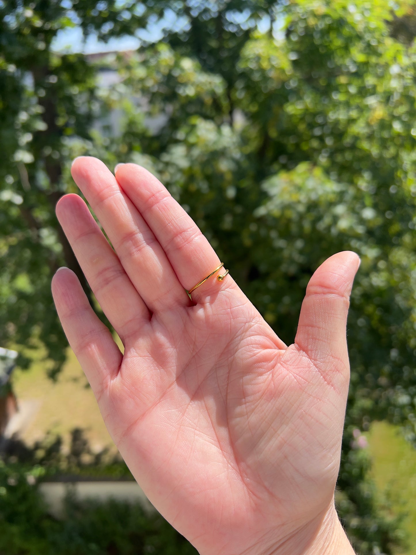 Rain or Shine Fidget-Ring – Drehbarer Anti-Stress-Ring in Goldoptik