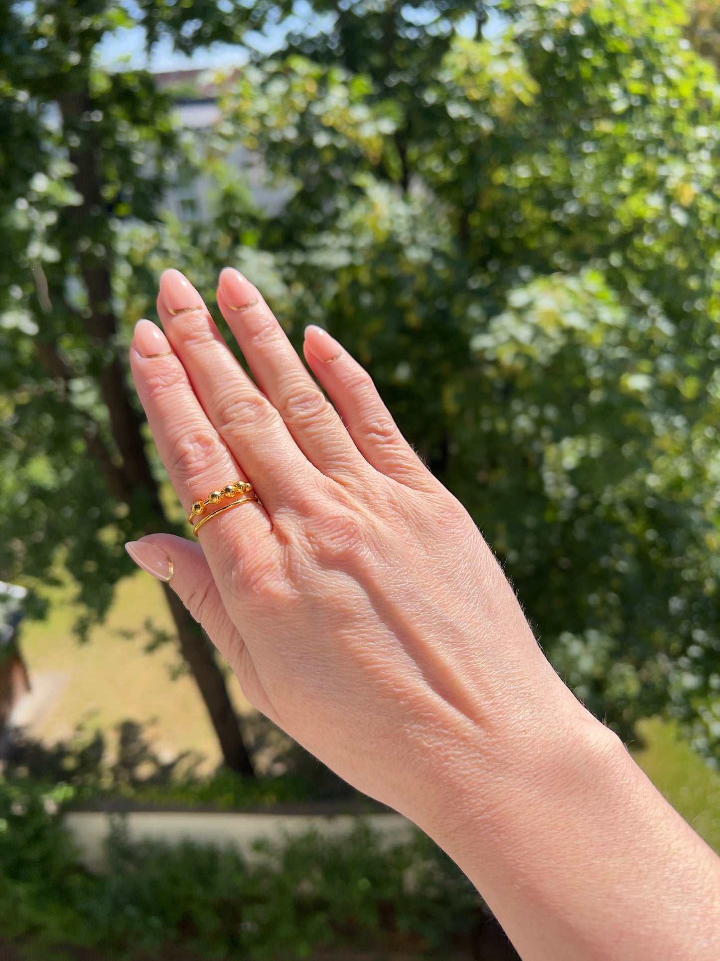 Rain or Shine Fidget-Ring – Drehbarer Anti-Stress-Ring in Goldoptik